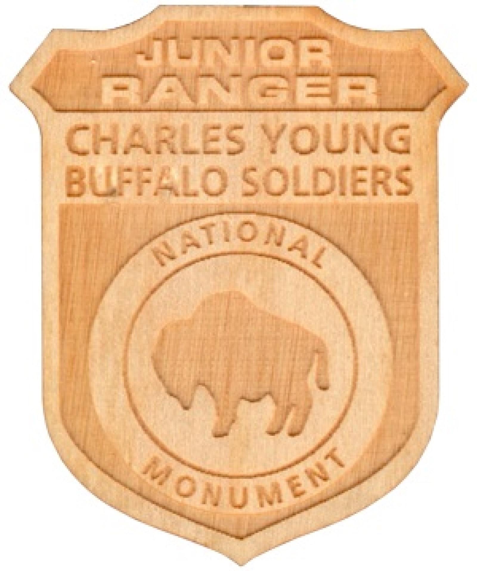 Wooden junior ranger badge that says Charles Young Buffalo Soldiers National Monument