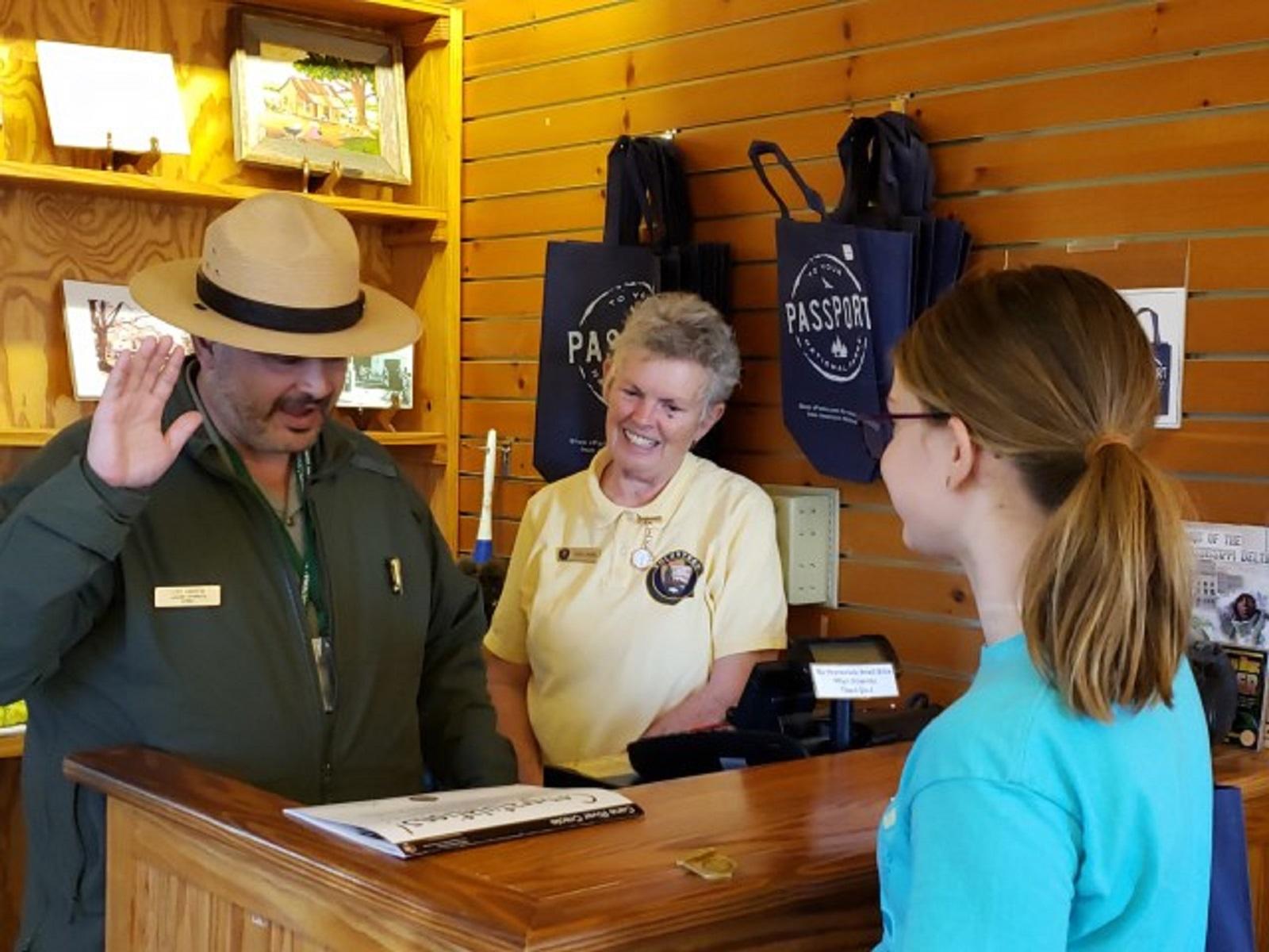 A Park Ranger leads a new Junior Ranger in the Junior Ranger Oath