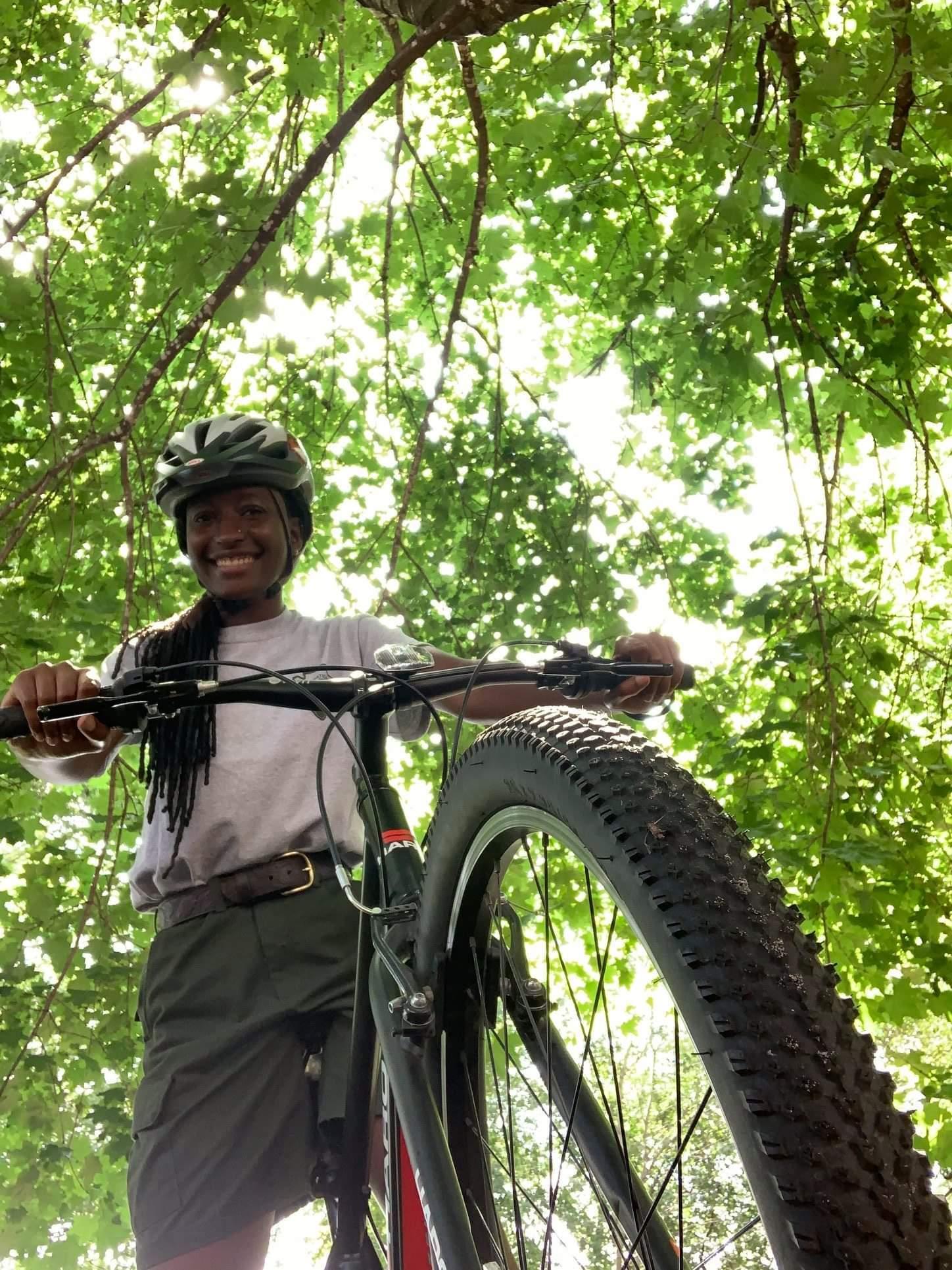 A ranger on a bicycle