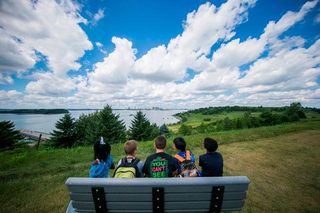 Children looking out at Boston from the Harbor Islands