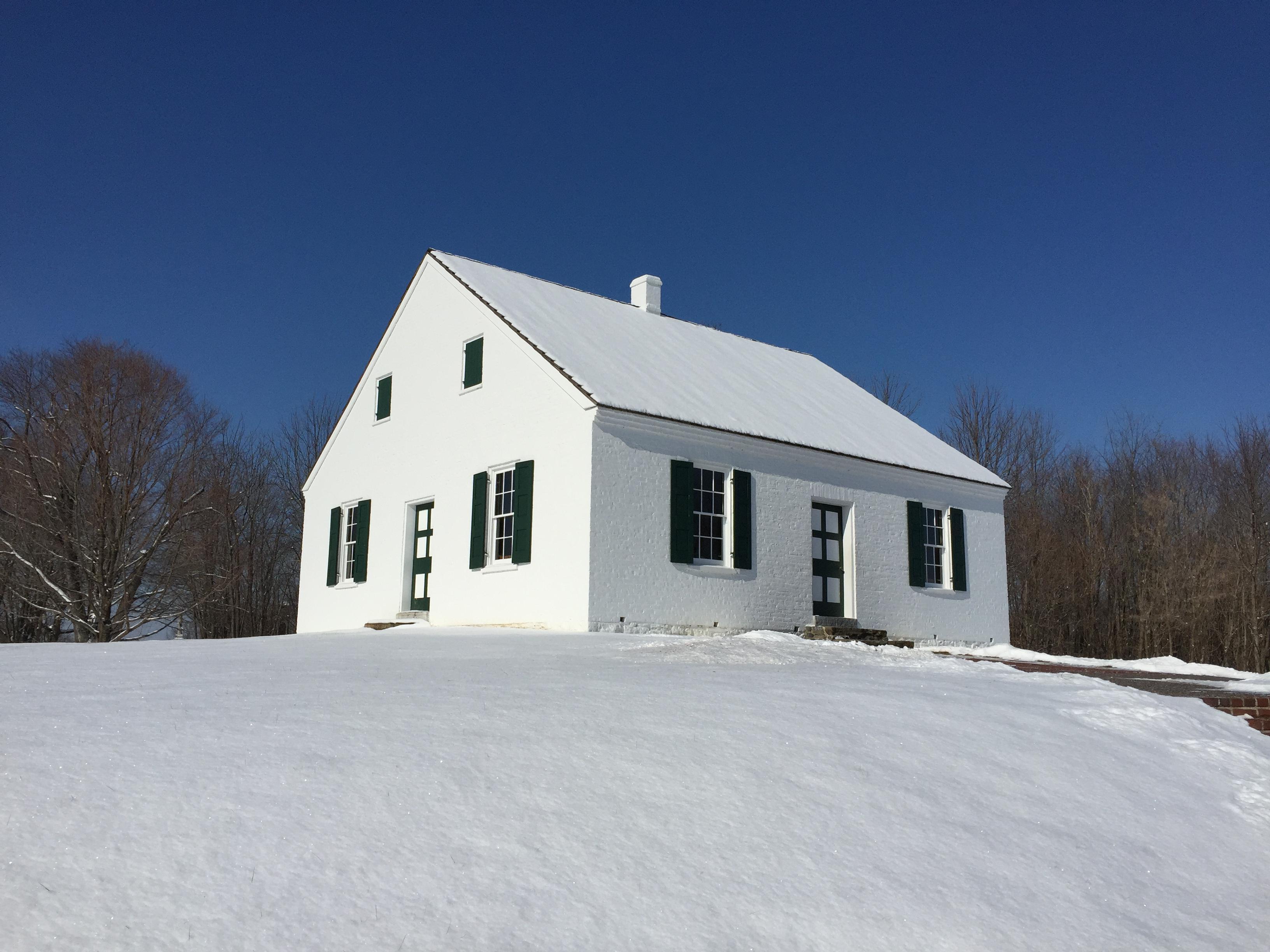 one room house covered in snow