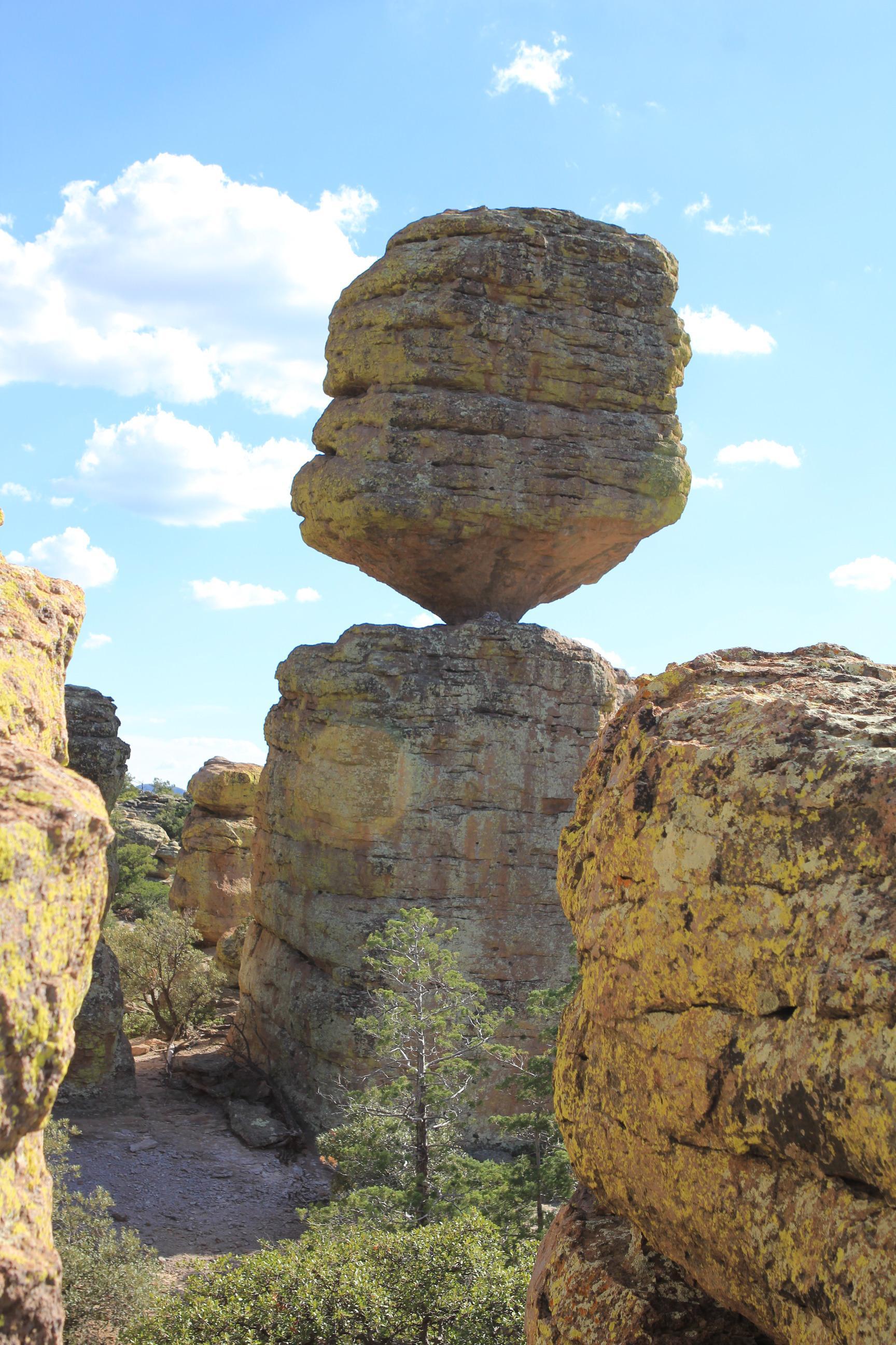 Large rock balanced on a small point